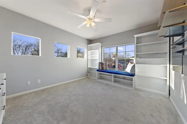 a room with furniture and window