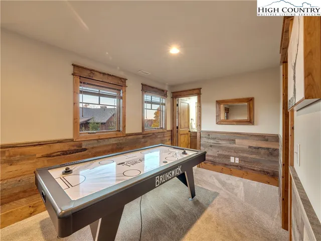 a living room with a couch and a table