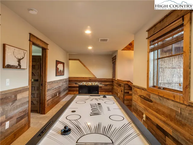 a view of a living room with a large window