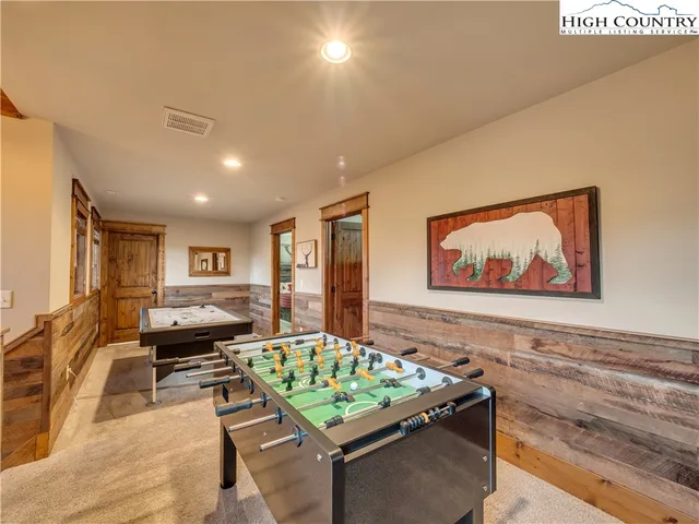 a living room with furniture and couch