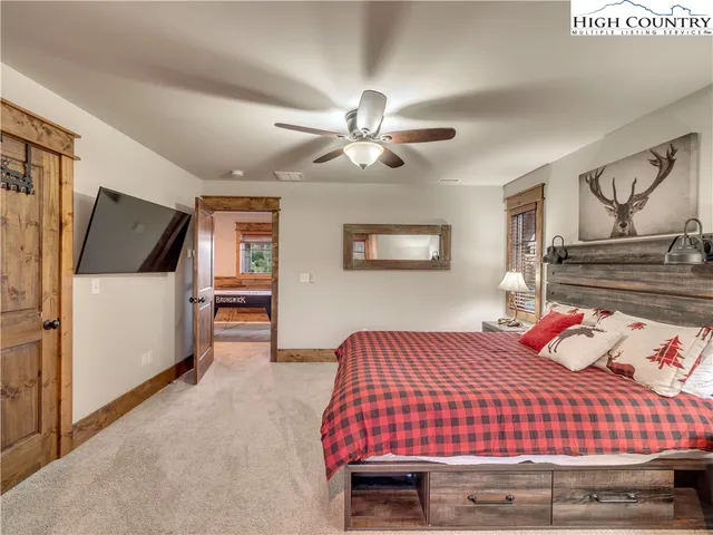 a bedroom with a bed and furniture