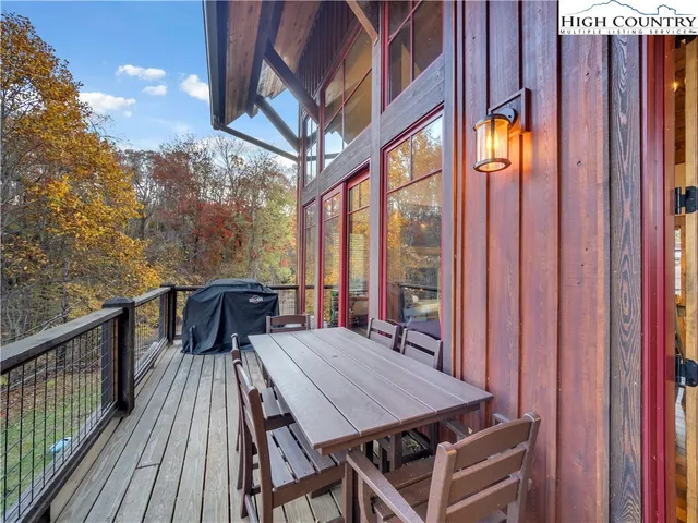 a view of a balcony with chairs