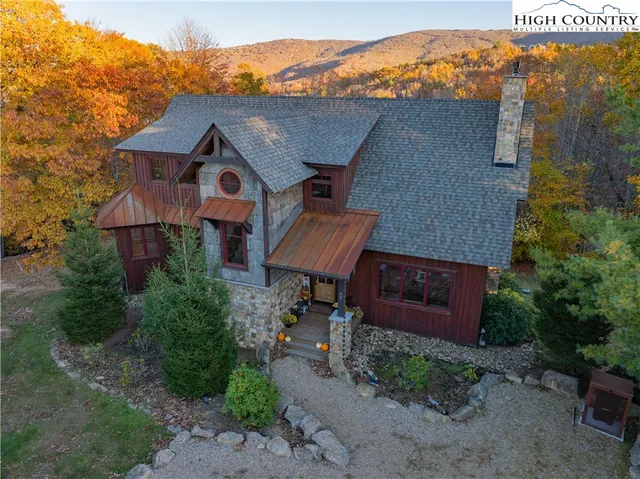 an aerial view of a house with a garden