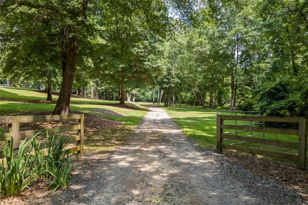 3651 Chandler Haulk Road Loganville, GA 30052 - Photo 14 of 33 a view of a park with large trees