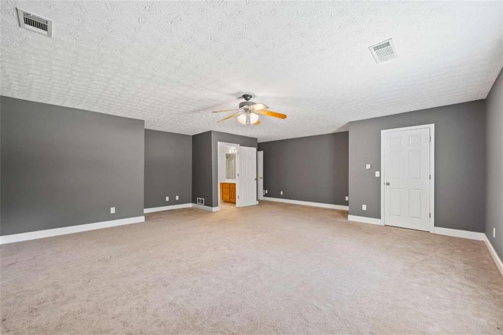 3651 Chandler Haulk Road Loganville, GA 30052 - Photo 25 of 33 a view of an empty room with a window