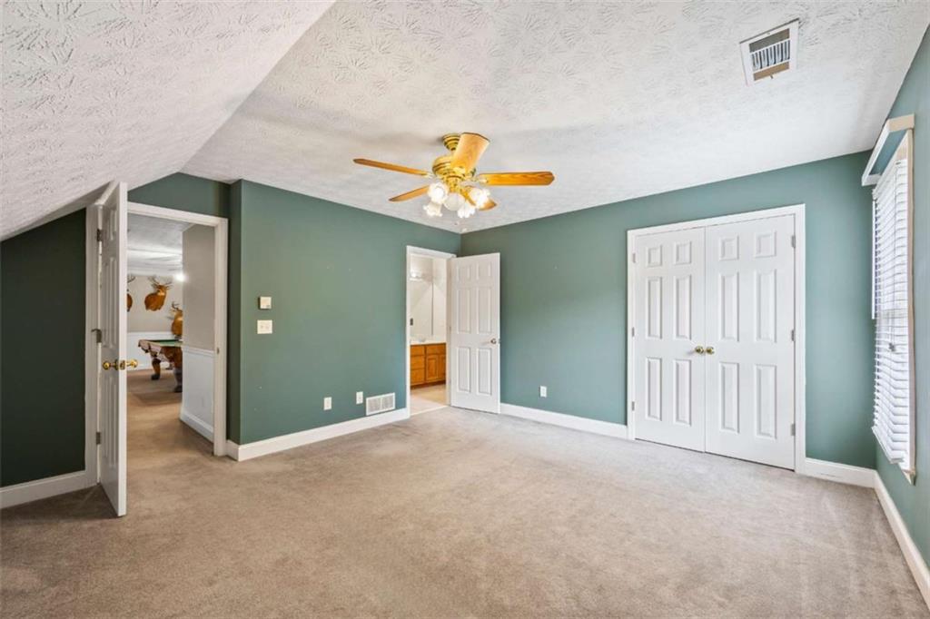 3651 Chandler Haulk Road Loganville, GA 30052 - Photo 27 of 33 wooden floor and window in a room