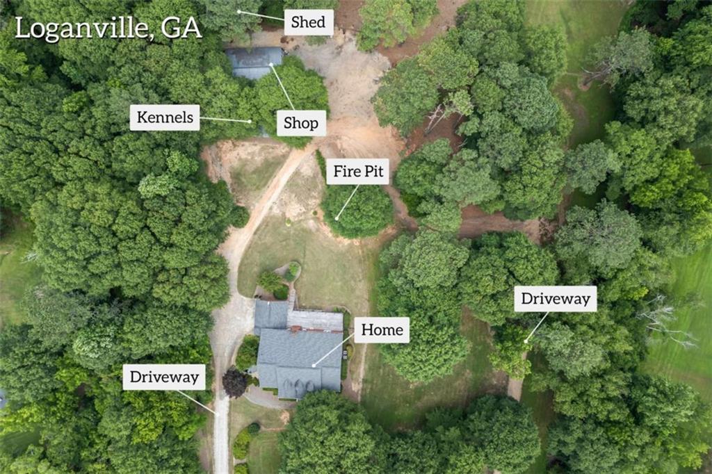 3651 Chandler Haulk Road Loganville, GA 30052 - Photo 4 of 33 an aerial view of residential house with outdoor space and parking