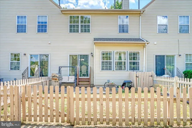 a front view of a house with a porch
