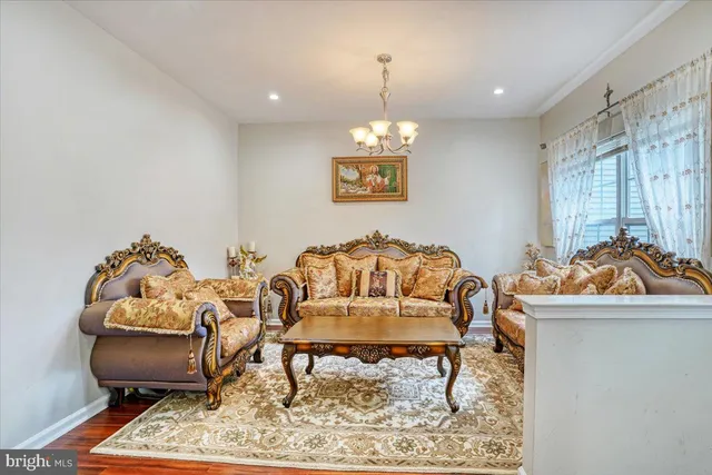 a living room with furniture and a table