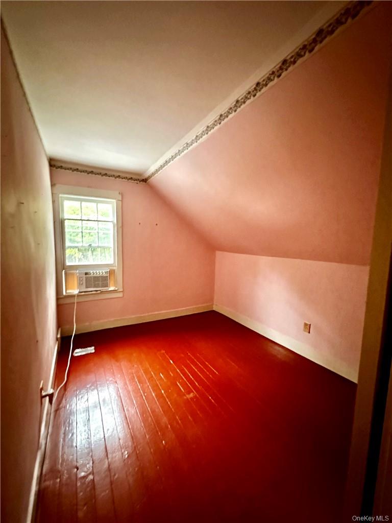 112 Eldred-Yulan Road Eldred, NY 12732 - Photo 18 of 26 an empty room with wooden floor and windows