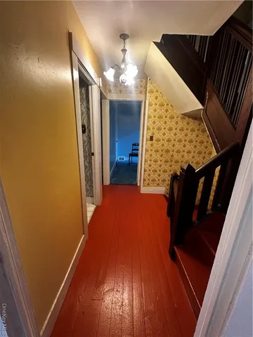 en suite bathroom with a sink and mirror