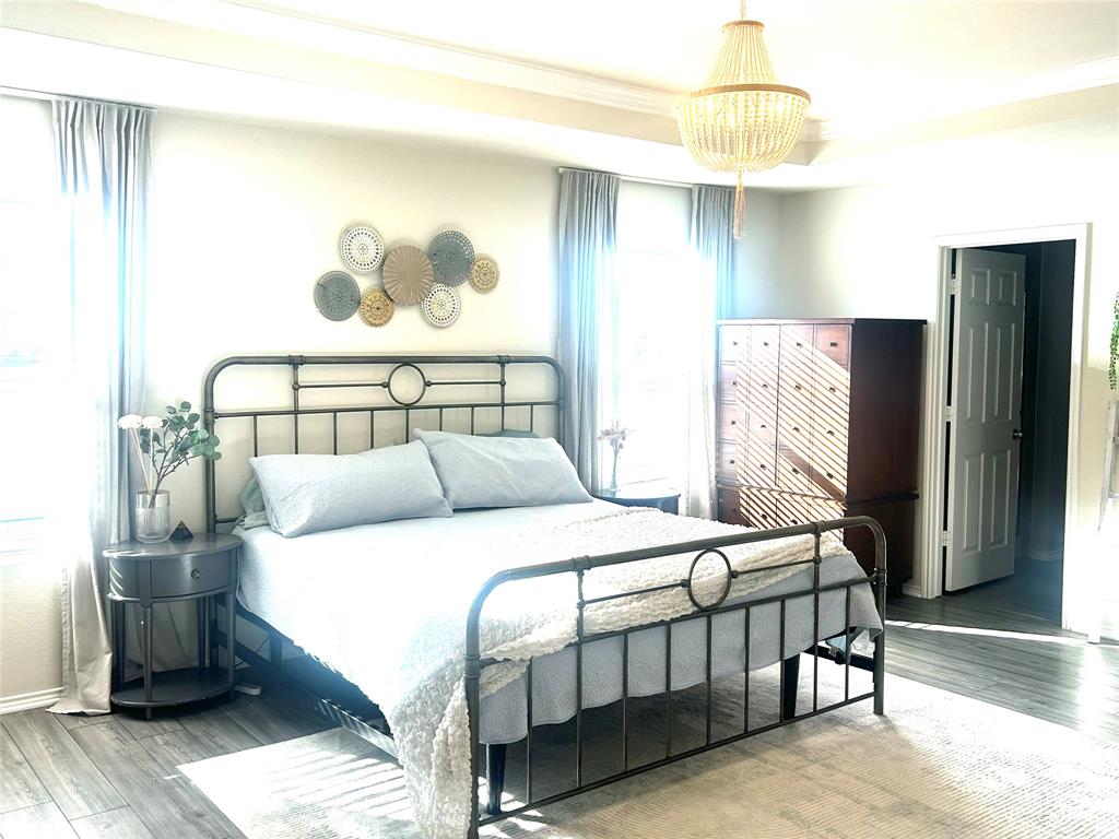 455 Manchester Street Van Alstyne, TX 75495 - Photo 12 of 21 Gorgeous primary bedroom suite