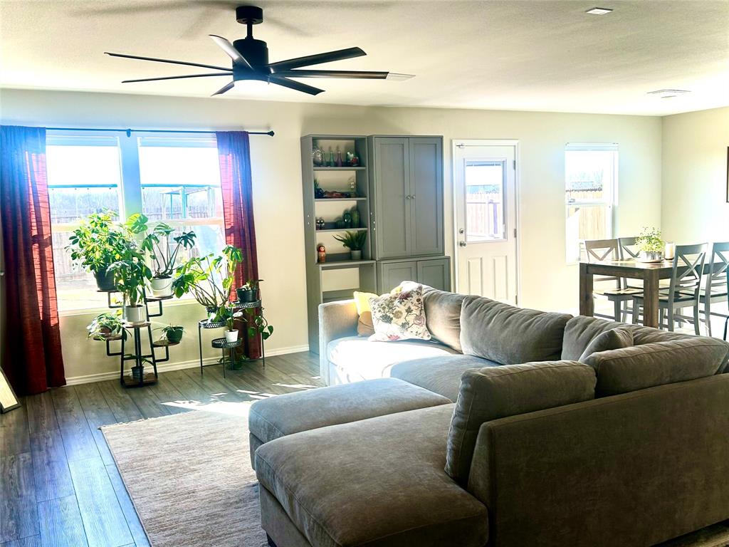 455 Manchester Street Van Alstyne, TX 75495 - Photo 2 of 21 Beautiful living room area open to kitchen and dining area