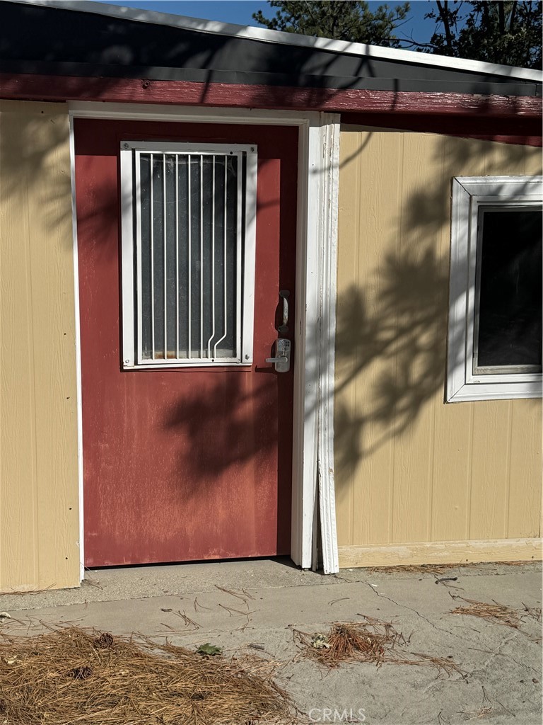 27914 West Shore Road Lake Arrowhead, CA 92352 - Photo 19 of 22 a view of a door of the house