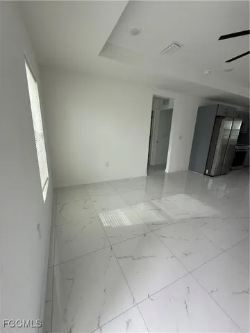 a bathroom with a double vanity sink toilet and shower