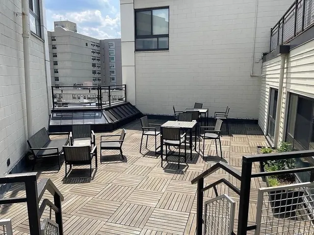 a view of balcony and chairs