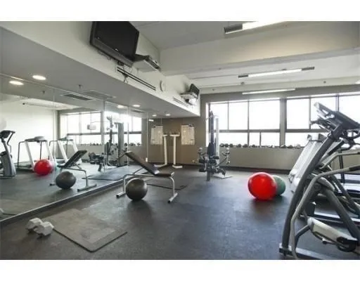a gym room with gym equipment