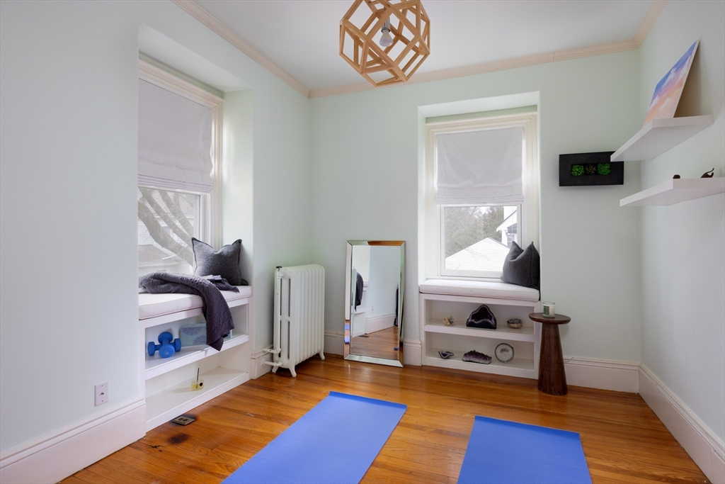 75 Clinton Place Newton, MA 02459 - Photo 15 of 18 a bedroom with furniture and a window