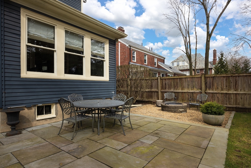 75 Clinton Place Newton, MA 02459 - Photo 16 of 18 a view of a patio with couple of chairs