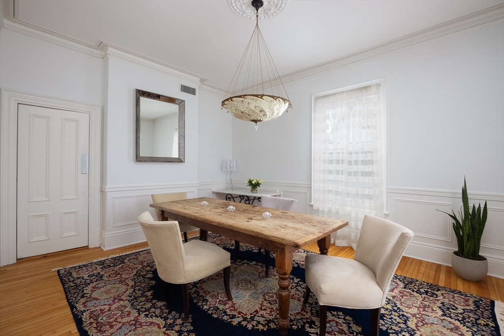 75 Clinton Place Newton, MA 02459 - Photo 4 of 18 a view of a room with furniture and window