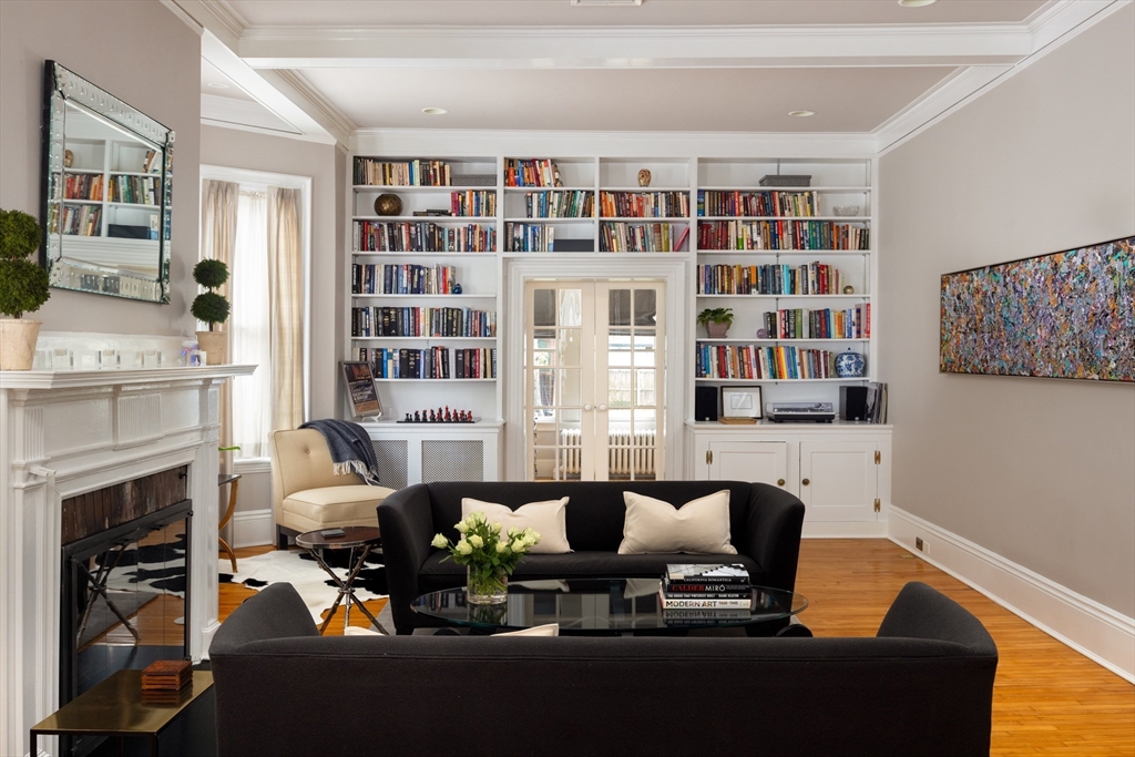75 Clinton Place Newton, MA 02459 - Photo 8 of 18 a living room with furniture window and fireplace