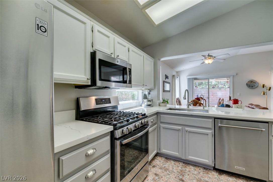 2187 Chapman Ranch Drive Henderson, NV 89012 - Photo 12 of 26 This bright kitchen features contemporary finishes and efficient design.