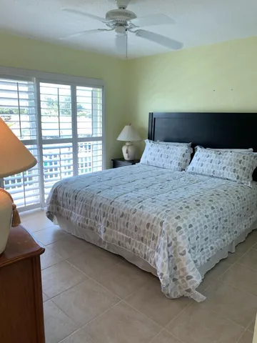 a living room with furniture a window and a couch