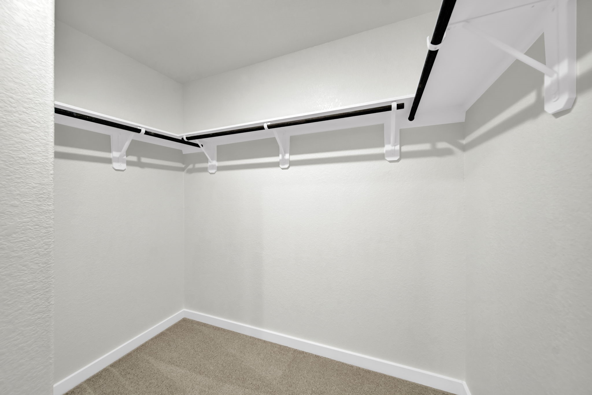 16675 Sterling Clf Street Conroe, TX 77302 - Photo 11 of 21 a view of an empty walk in closet