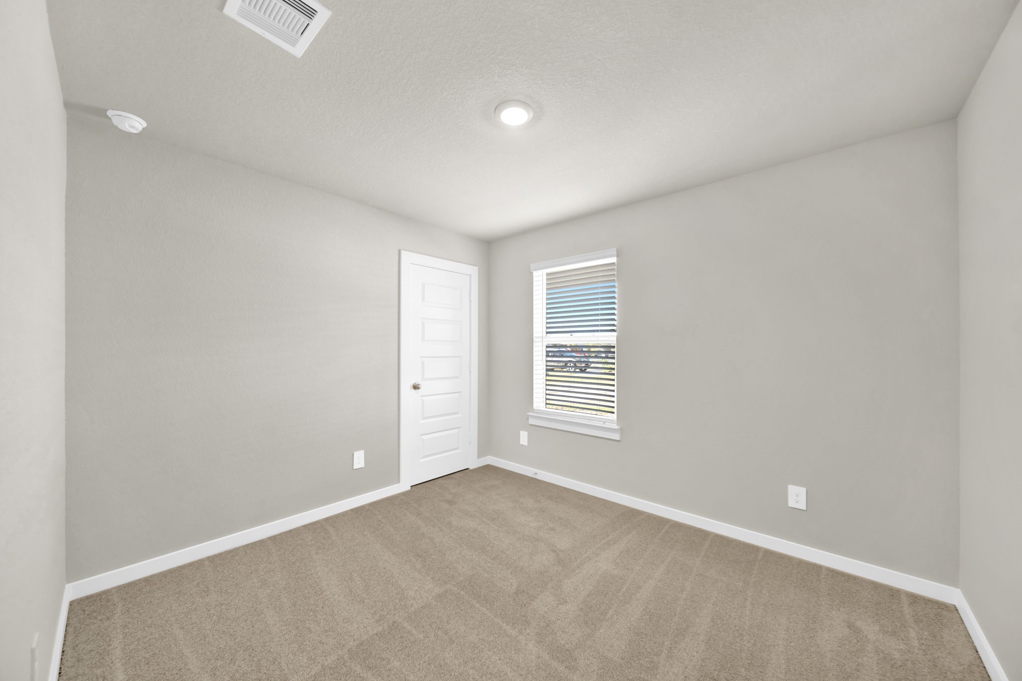 16675 Sterling Clf Street Conroe, TX 77302 - Photo 12 of 21 an empty room with windows