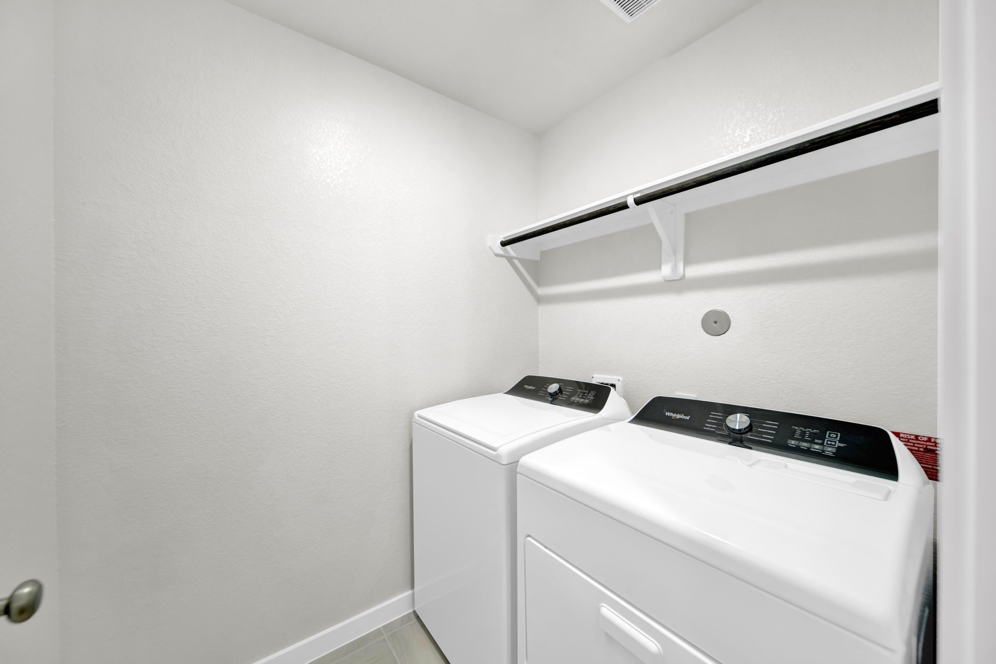 16675 Sterling Clf Street Conroe, TX 77302 - Photo 15 of 21 a utility room with dryer and washer
