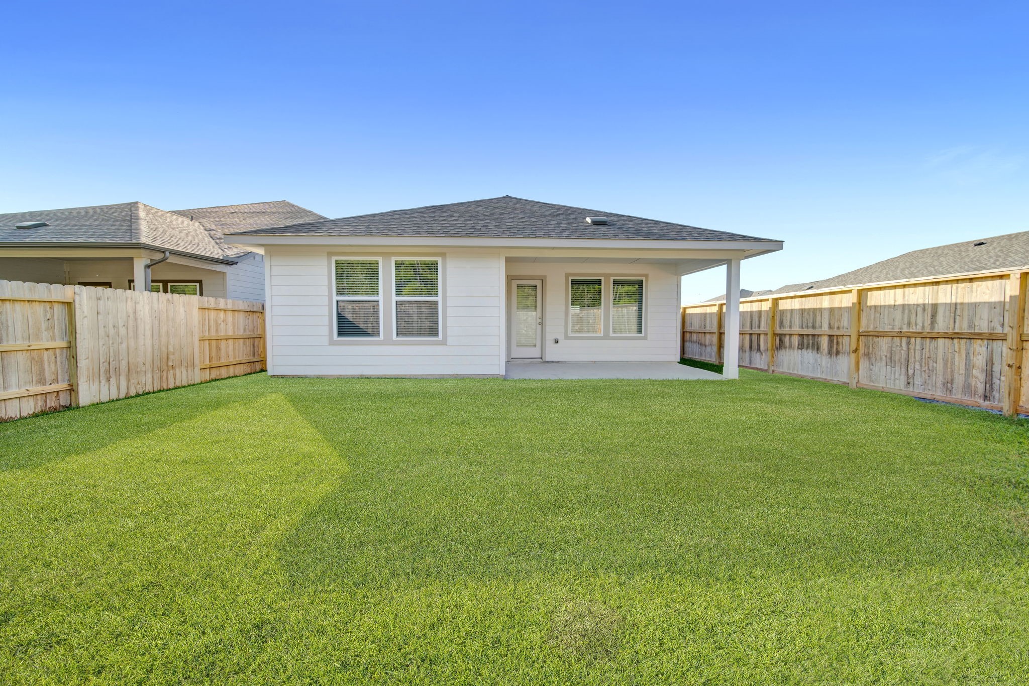 16675 Sterling Clf Street Conroe, TX 77302 - Photo 17 of 21 a view of a house with a backyard