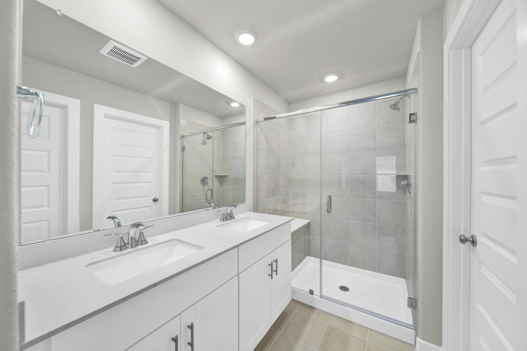 16675 Sterling Clf Street Conroe, TX 77302 - Photo 10 of 21 a bathroom with a shower sink and mirror