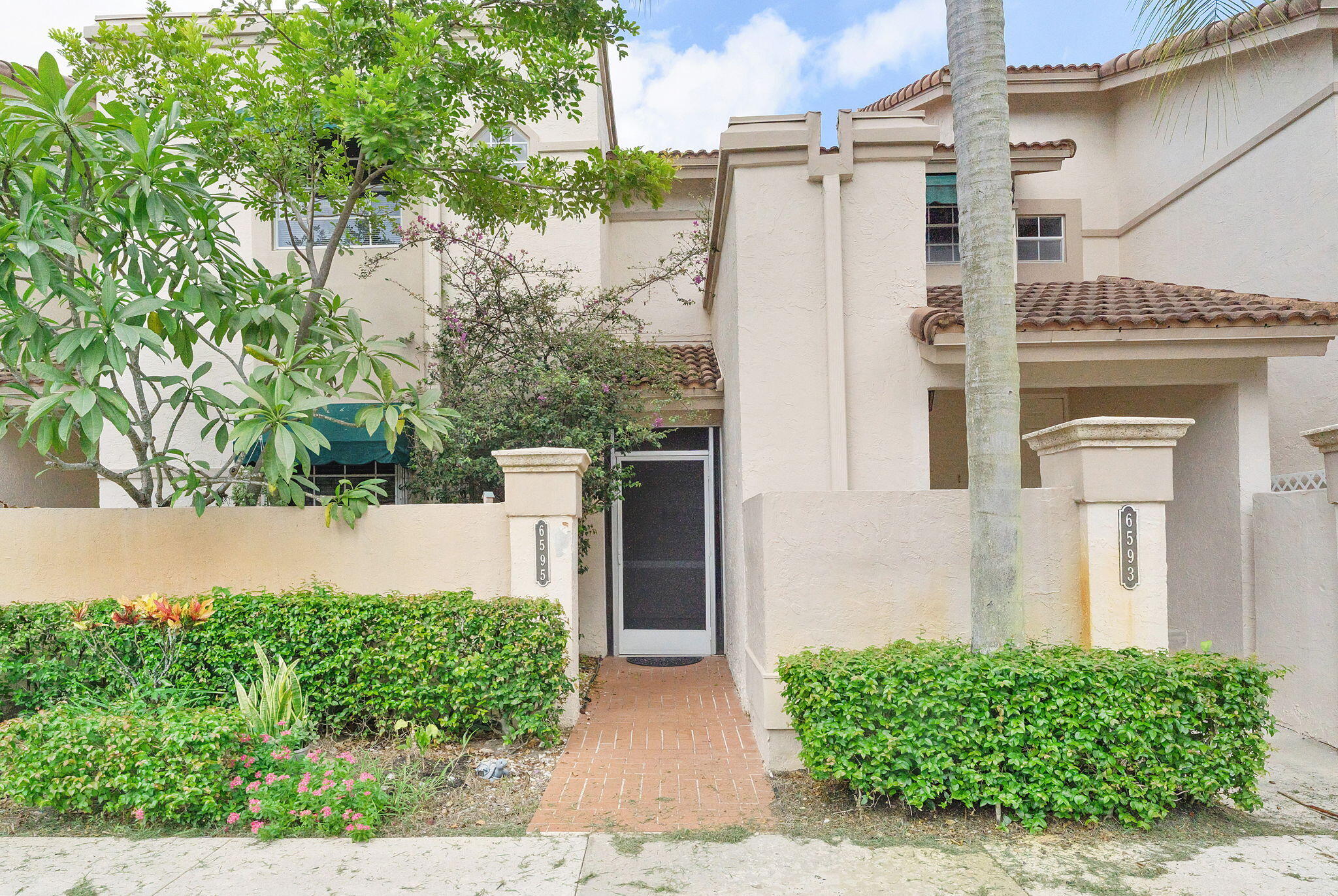 6595 Via Regina Boca Raton, FL 33433 - Photo 1 of 25 Front View