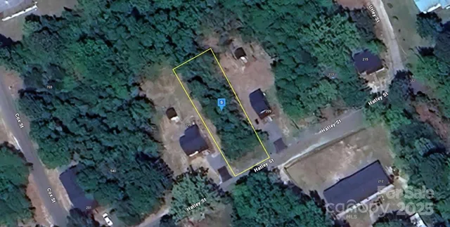 an aerial view of a house with outdoor space