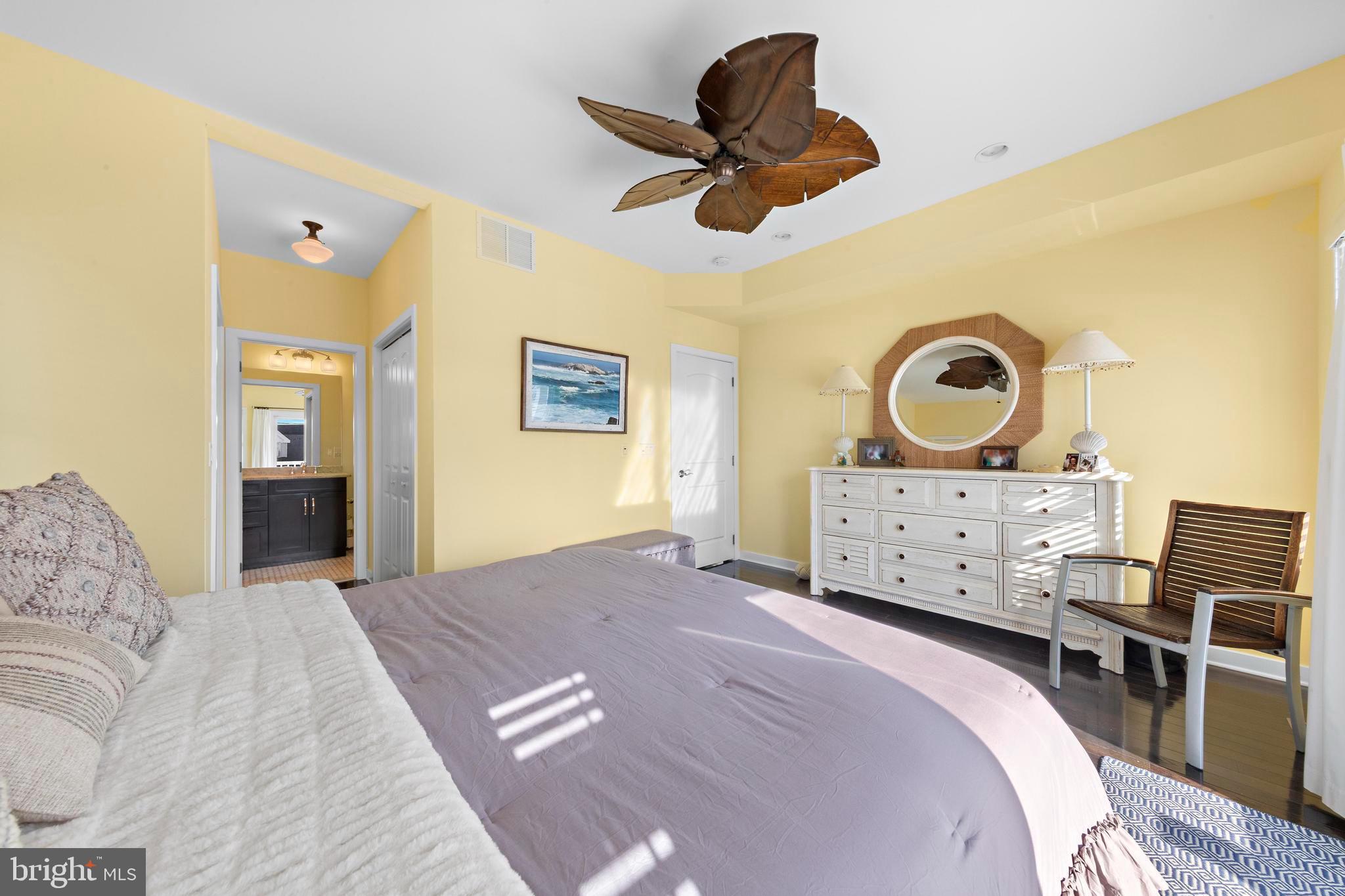 27 West 33rd Street Long Beach Township, NJ 08008 - Photo 18 of 83 a bedroom with a bed and ceiling fan