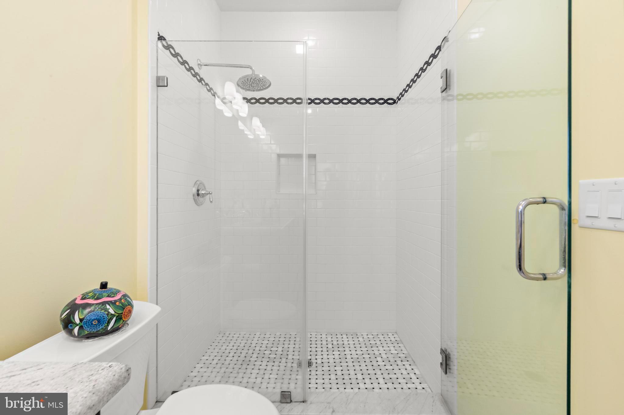 27 West 33rd Street Long Beach Township, NJ 08008 - Photo 23 of 83 a bathroom with a shower and a toilet