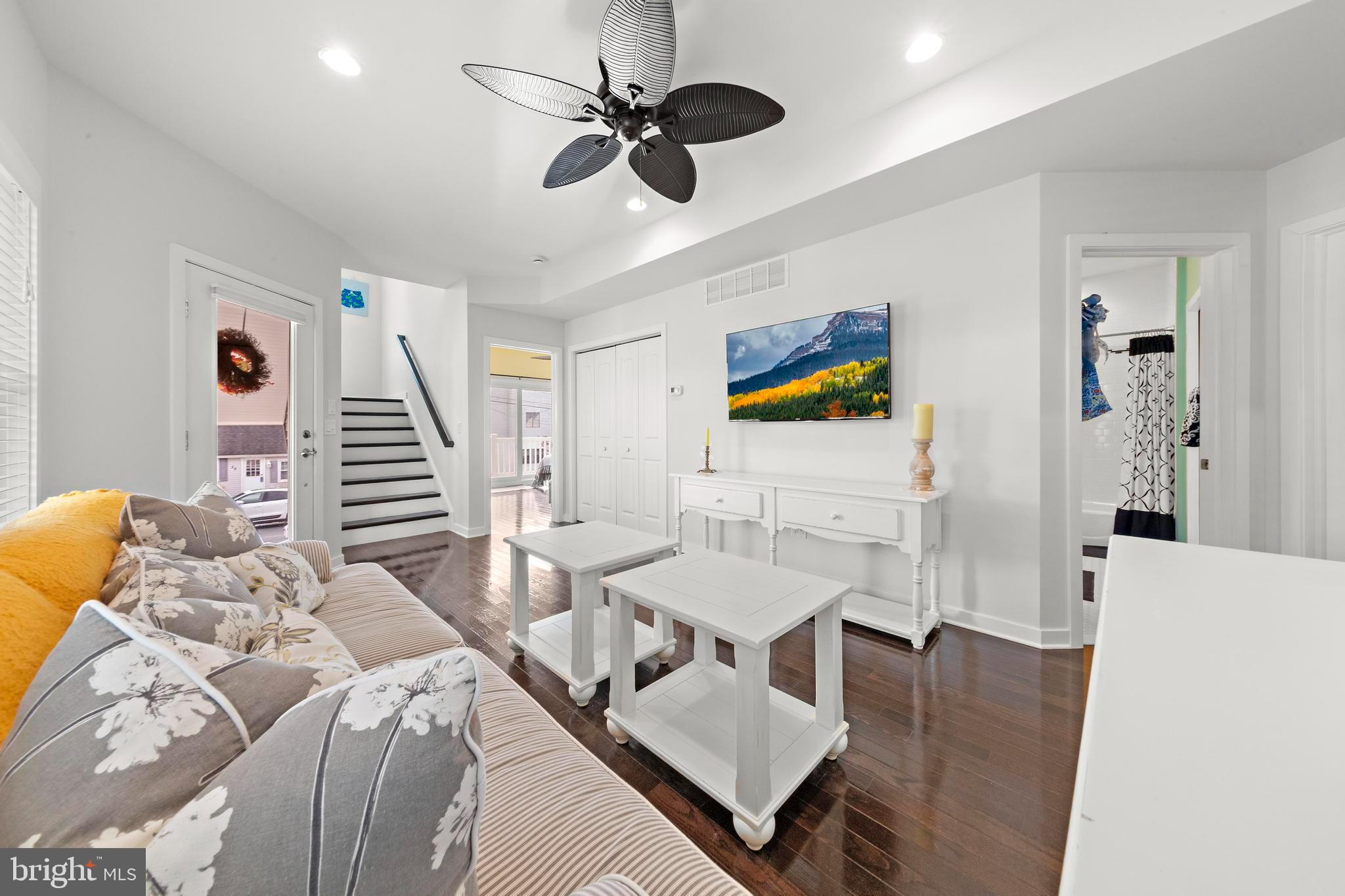 27 West 33rd Street Long Beach Township, NJ 08008 - Photo 24 of 83 a living room with furniture and a wooden floor