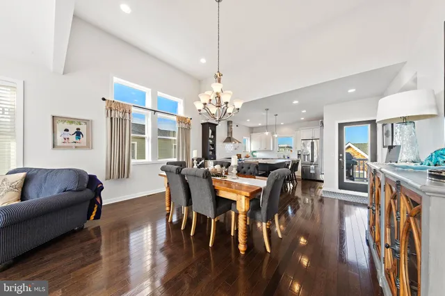 a living room with furniture fireplace and a flat screen tv