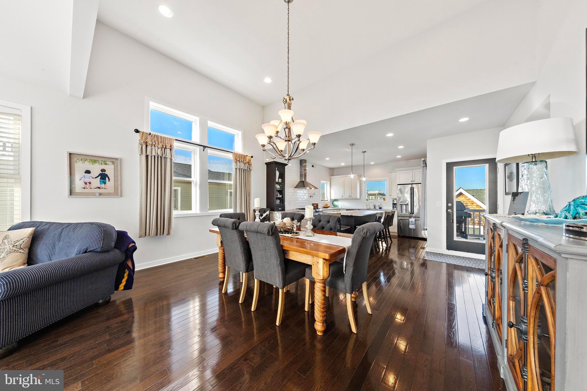 27 West 33rd Street Long Beach Township, NJ 08008 - Photo 25 of 83 a view of a dining room with furniture window and wooden floor