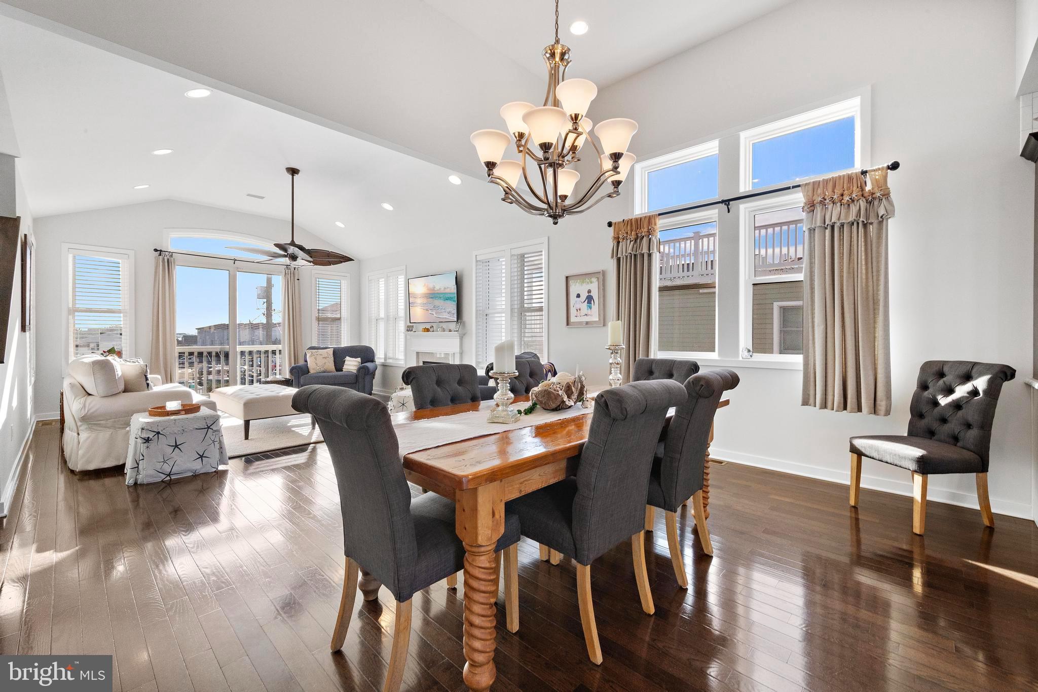 27 West 33rd Street Long Beach Township, NJ 08008 - Photo 26 of 83 a view of a dining room with furniture wooden floor and chandelier