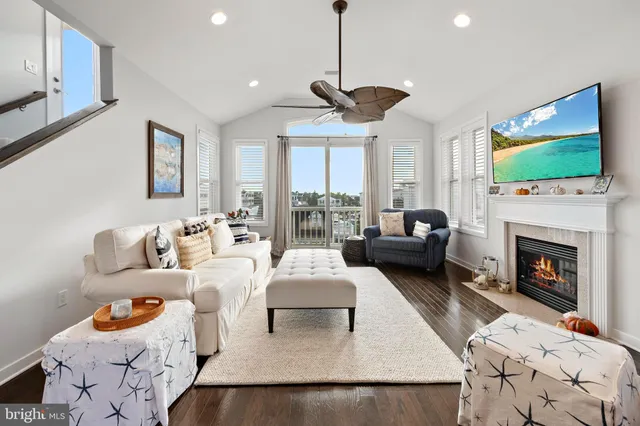 a view of entryway with wooden floor and a potted plant