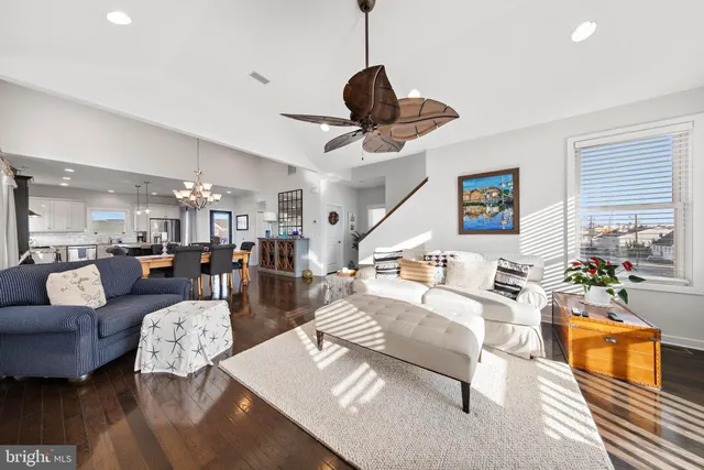 a view of a house with backyard porch and sitting area