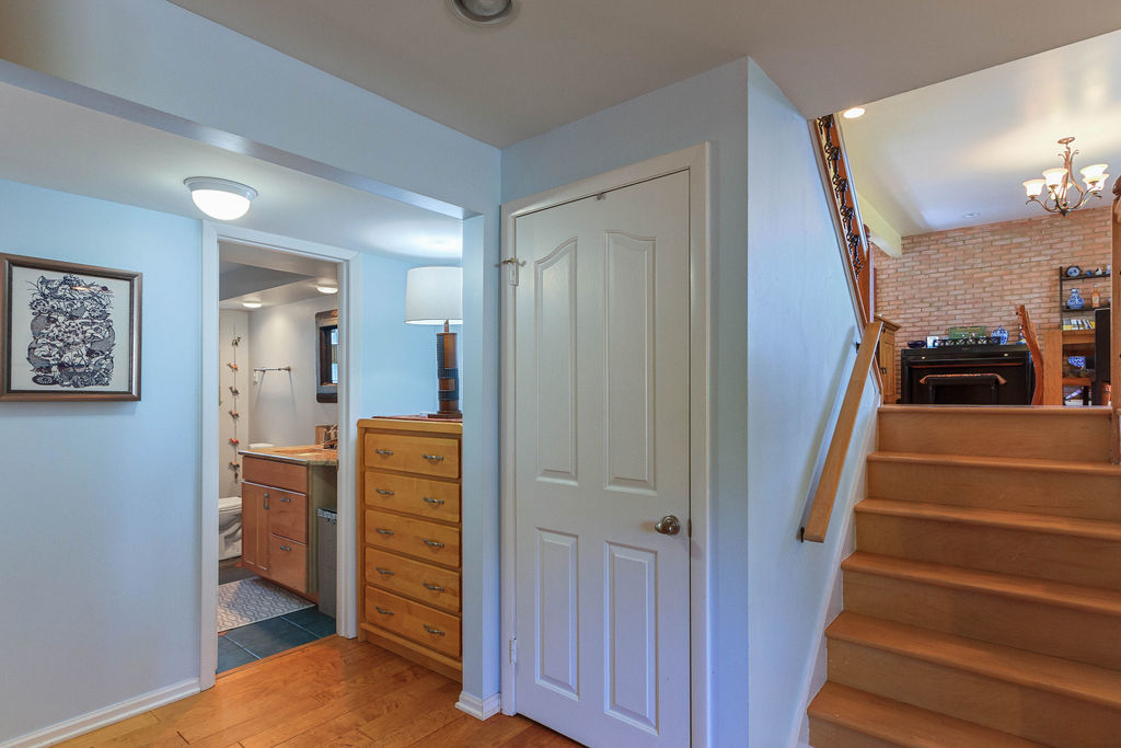 789 Ridge Road Highland Park, IL 60035 - Photo 26 of 36 a view of a hallway with closet and wooden floor