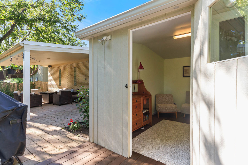 789 Ridge Road Highland Park, IL 60035 - Photo 30 of 36 a view of a room that has a bed and glass door