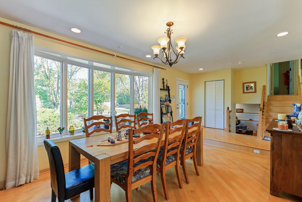 789 Ridge Road Highland Park, IL 60035 - Photo 8 of 36 a view of a dining room with furniture window and outside view