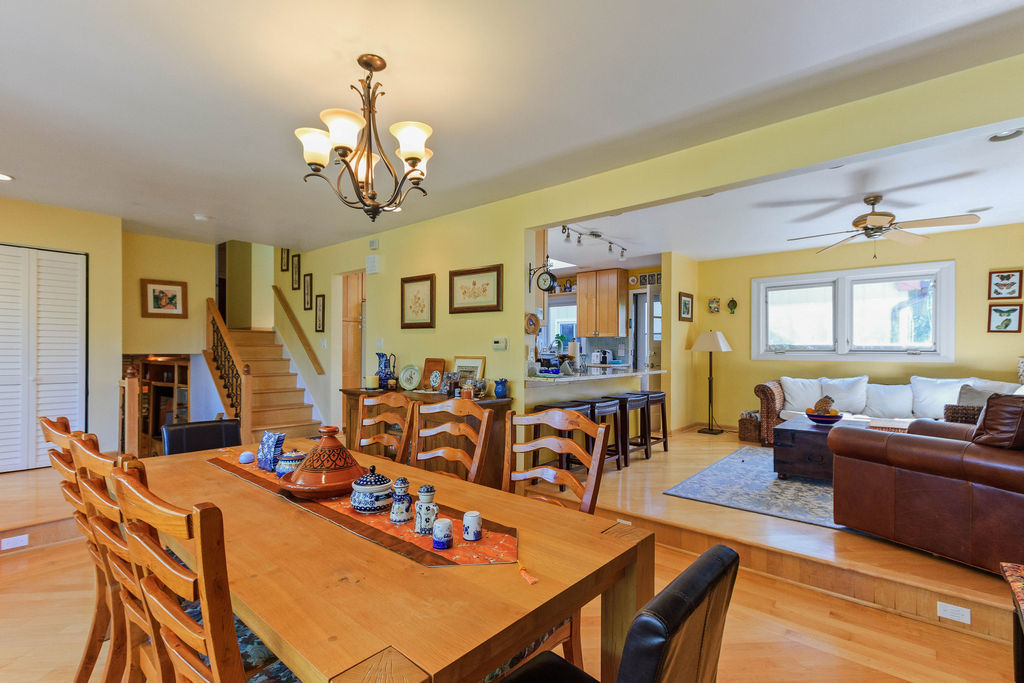 789 Ridge Road Highland Park, IL 60035 - Photo 9 of 36 a view of a dining room with furniture a chandelier and wooden floor