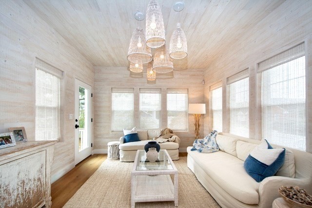 430 Hatherly Road, Unit EXHIBIT “B” Scituate, MA 02066 - Photo 2 of 18 a living room with furniture chandelier and a large window