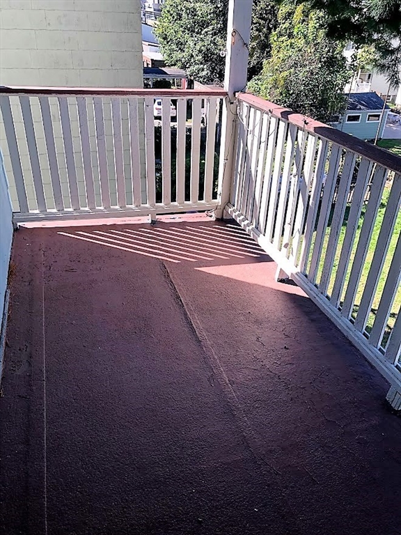28 Litchfield Street, Unit 3 Boston, MA 02135 - Photo 10 of 11 a view of a backyard with deck and deck