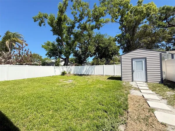 a view of a backyard with a garden