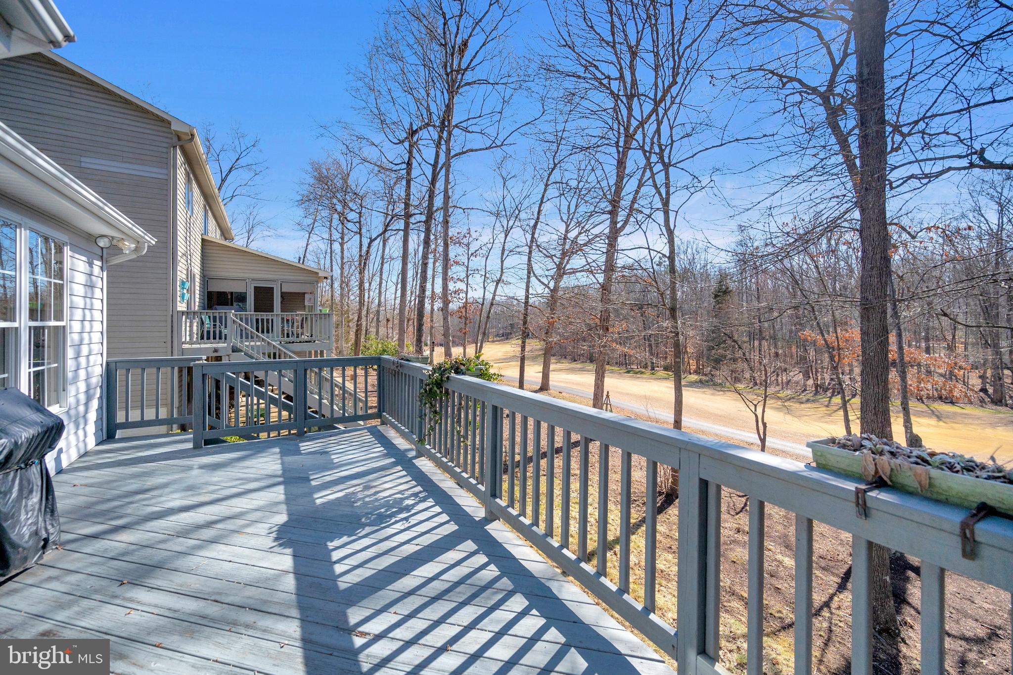 212 Birdie Road Locust Grove, VA 22508 - Photo 9 of 46 Sizable back deck off sunroom